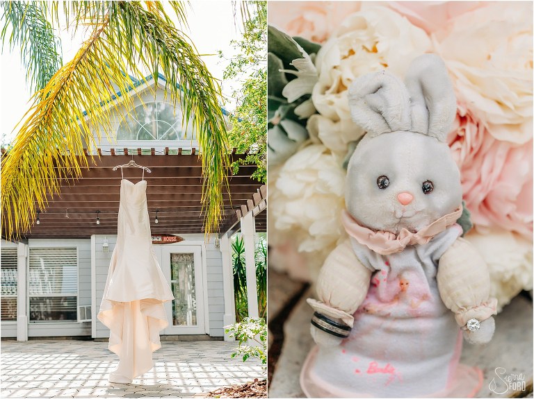 on left, Eddy K bridal gown hangs between palm leaves before Disney themed garden wedding, on right, couple's wedding rings on the arms of bride's childhood stuffed rabbit