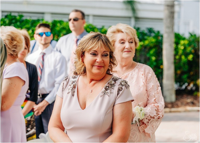 mother of the bride gets emotional as daughter is given away at Disney themed garden wedding ceremony