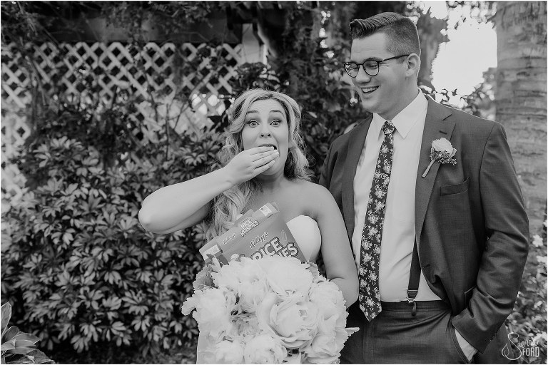 groom laughs as bride snacks on Rice Krispies cereal after Disney themed garden wedding ceremony