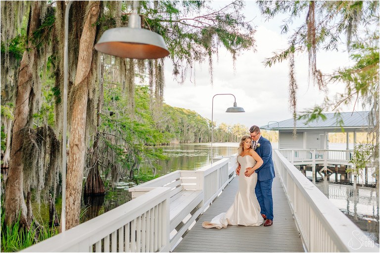 Paradise Cove wedding photos of couple on dock