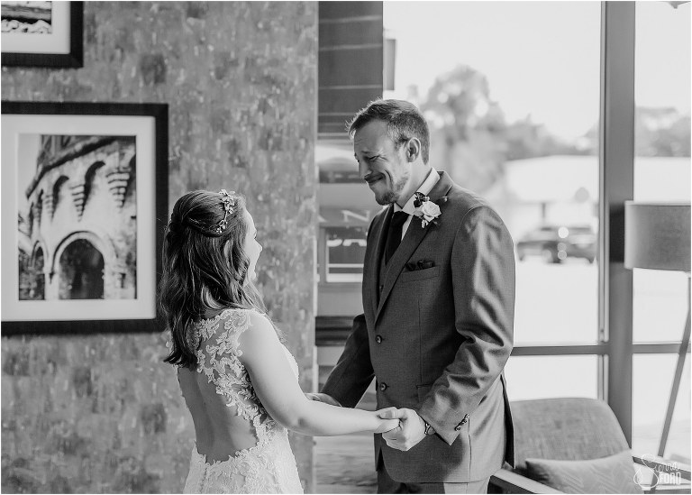groom smiles through tears as he sees bride for first time before Savannah elopement