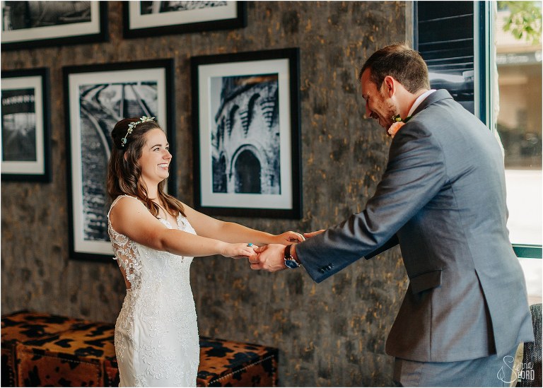 bride smiles from ear to ear as groom sees her for the first time before Savannah elopement