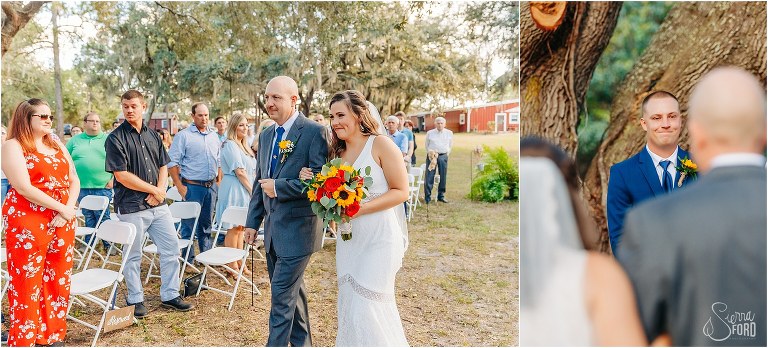 on left, bride smiles at groom as she comes down the aisle at DIY Florida Barn Wedding, on right, peek of emotional groom over shoulders of bride coming down aisle