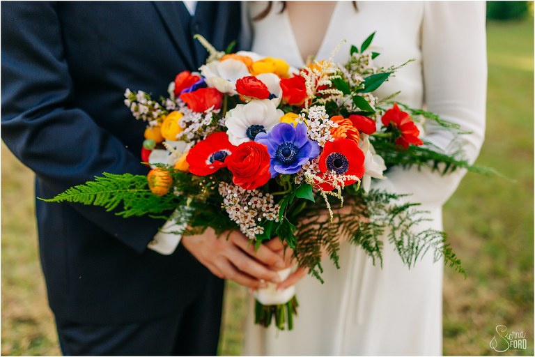 gorgeous red, blue, and white bridal bouquet by Eva's Creations for elegant backyard elopement