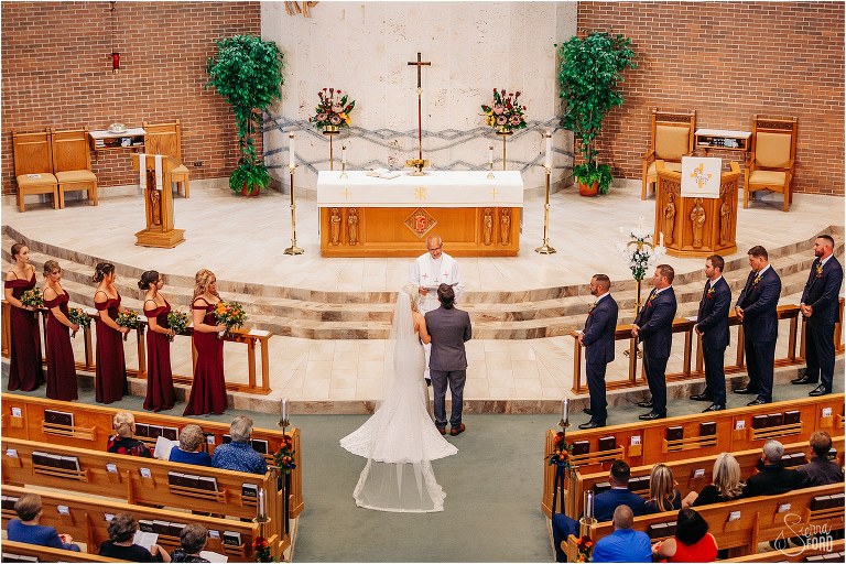 the view from the balcony as bride & groom stand at altar for Horsepower Ranch wedding