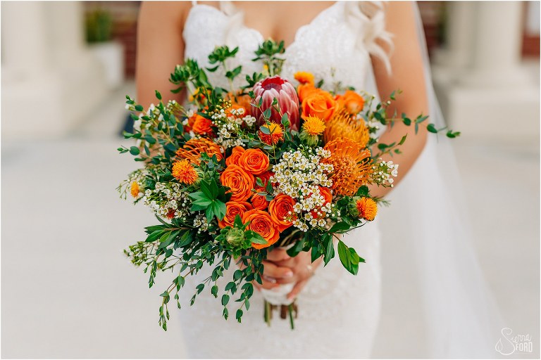 orange, white, and pink bridal bouquet from Oviedo Florist at Horsepower Ranch wedding