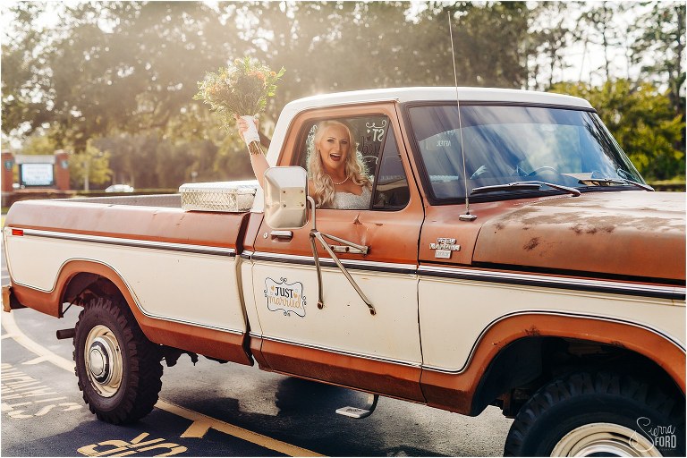 bride cheers as they drive off to Horsepower Ranch wedding reception in 1978 F-250