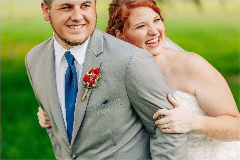 bride giggles as groom shakes his butt at Wildwood wedding
