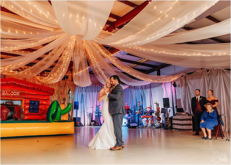 bride & groom share emotional first dance at Horsepower Ranch wedding