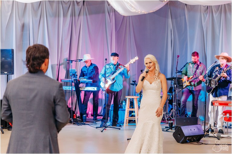 bride sings surprise song to groom with JKS Production at Horsepower Ranch wedding