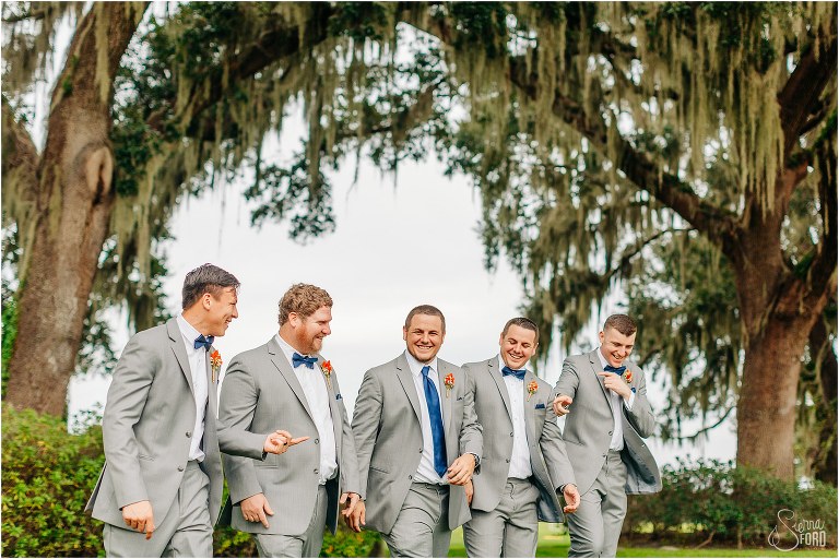 groom laughs with groomsmen before Wildwood wedding