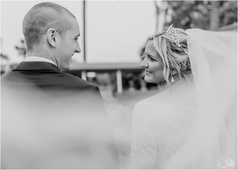 bride & groom look lovingly at each other from behind bride's veil at Mission Inn Resort wedding