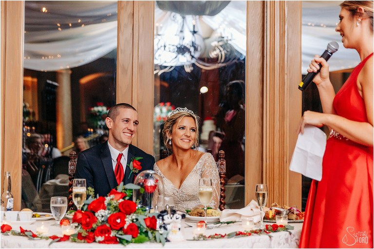 bride & groom listening to emotional maid of honor speech at Mission Inn Resort wedding reception