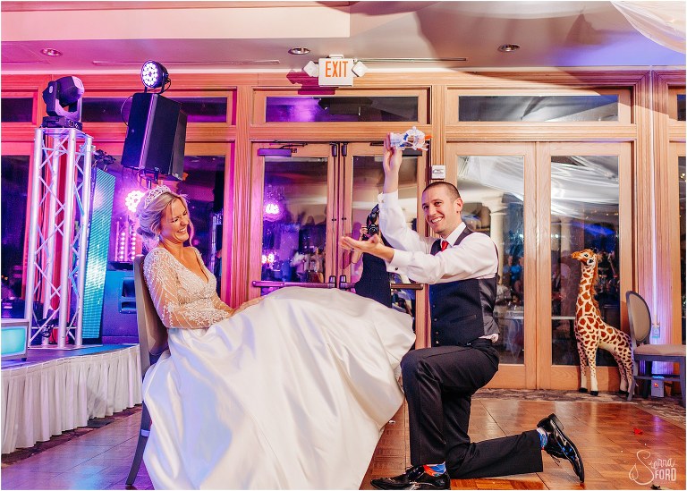 groom emerges victorious with bride's Florida Gators garter at Mission Inn Resort wedding