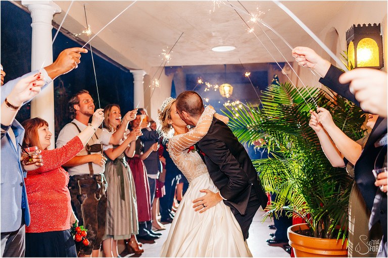 bride & groom kiss under sparkler exit at Mission Inn Resort wedding
