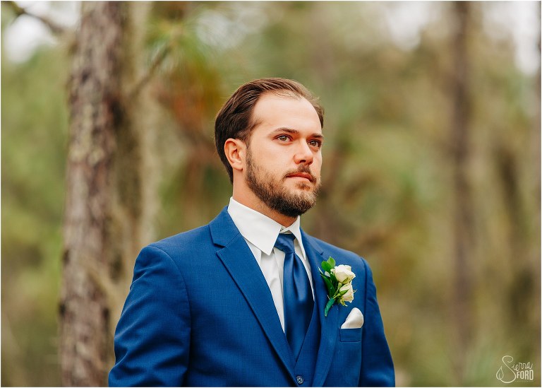 groom gets emotional before first look with bride at lakefront wedding
