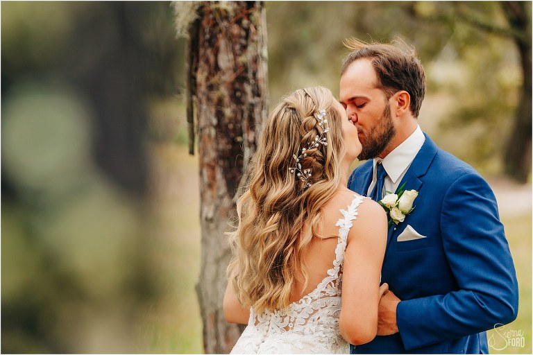 bride & groom share emotional kiss at first look before Skyline Ranch wedding