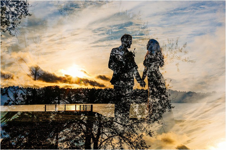 double exposure of bride and groom holding hands silhouetted against sunset at lakefront wedding
