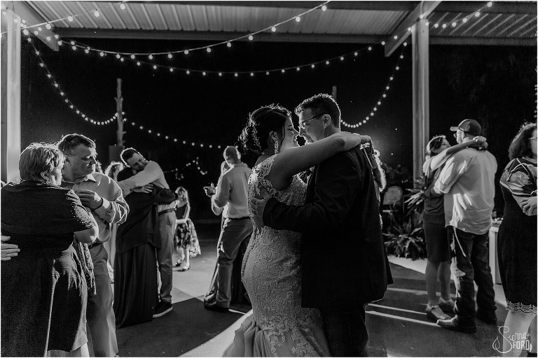 bride and groom share moment together during final dance of the night at Isola Farms wedding