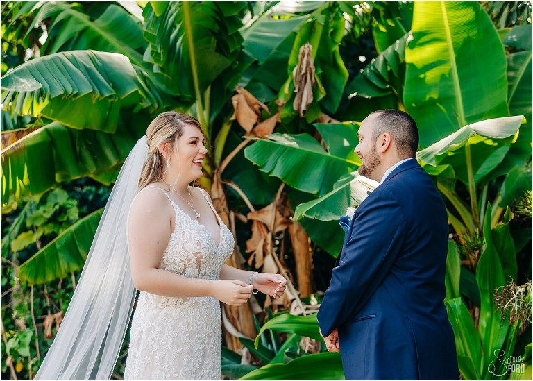 bride and groom smile from ear to ear seeing each other for first time before Tavares Pavilion wedding