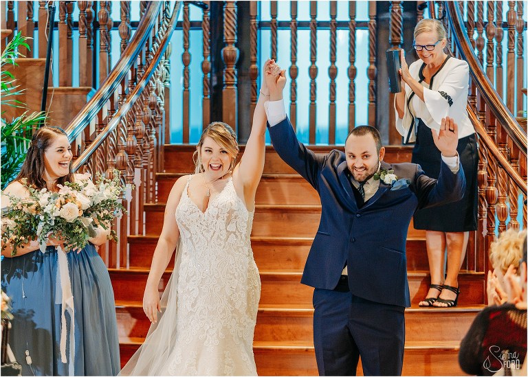 bride and groom cheer after being pronounced husband and wife at Tavares Pavilion wedding