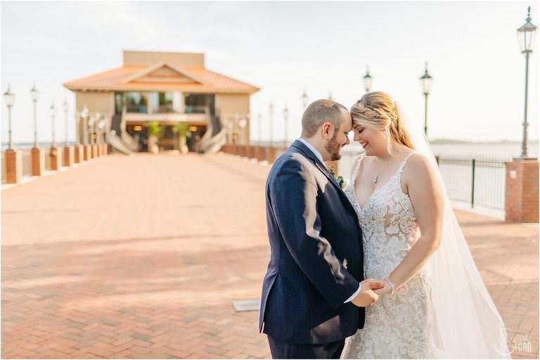 bride and groom are basked in sunlight glow at Tavares Pavilion wedding