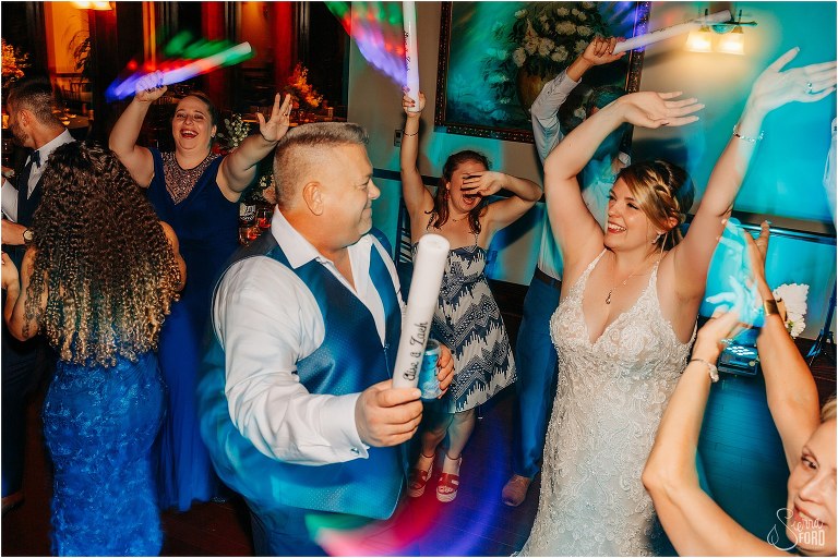 bride laughs as she dances with her father at Tavares Pavilion wedding