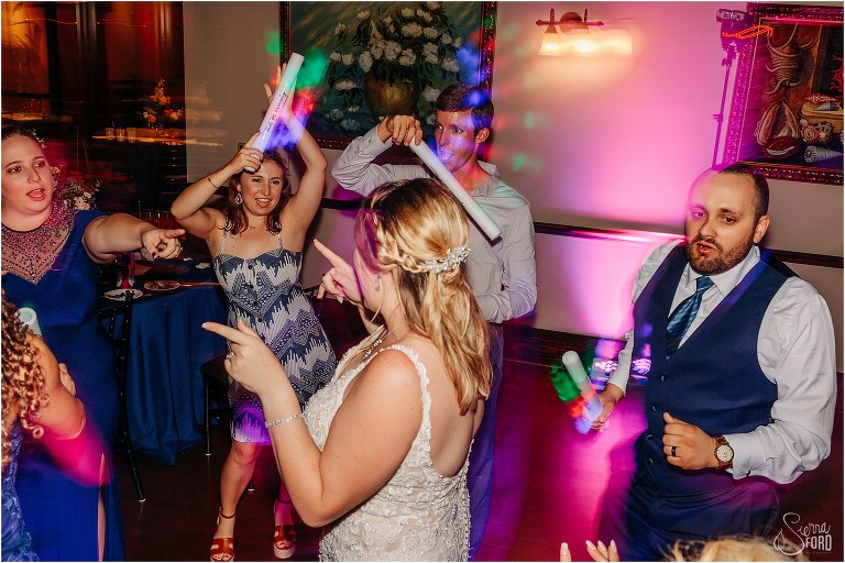 bride and groom dance with guests at Tavares Pavilion wedding