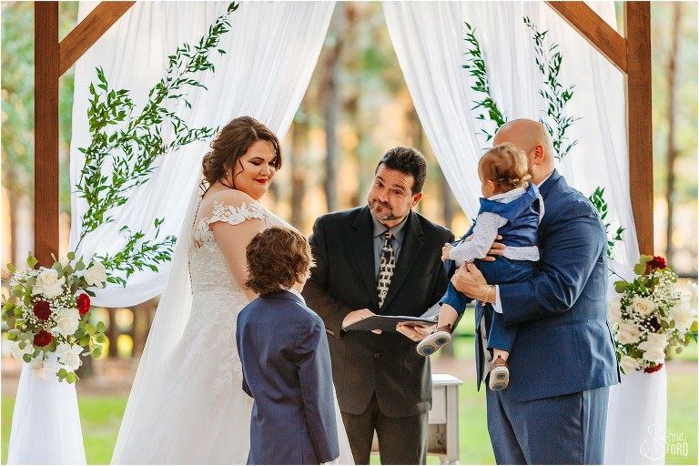 bride and groom involve their two children in rustic Apopka wedding ceremony