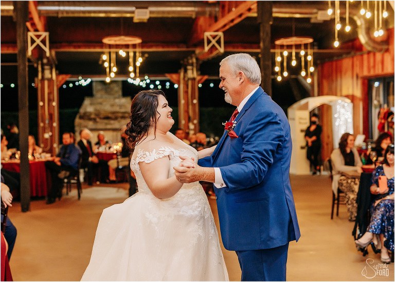 bride and her father grin as they share dance at rustic Apopka wedding