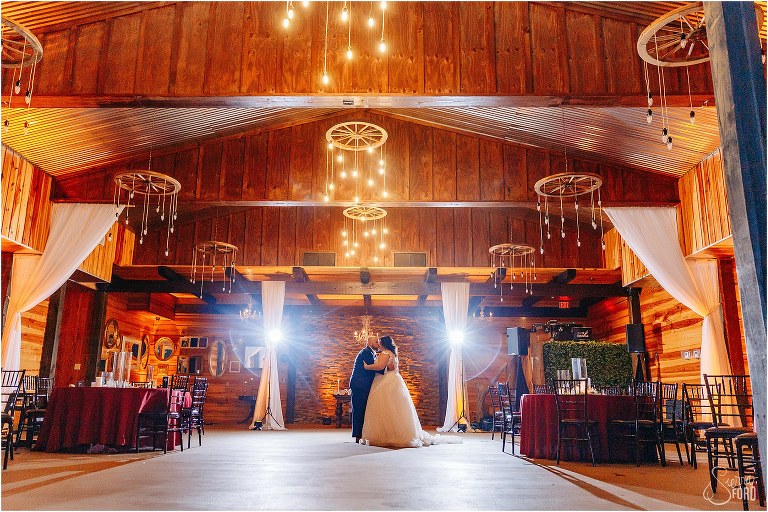 bride and groom share private last dance under chandeliers at Apopka wedding venue